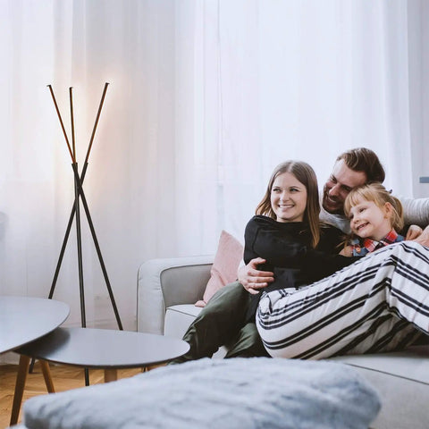 Family relaxing in living room with LED Tripod Floor Lamp With Dimmable Lights For Living Room Bedroom And Office