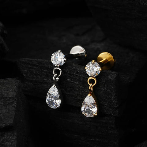 Top Shelf Titanium Cartilage Earring Flat Back Stud Featuring Interchangeable 6mm And 8mm Posts Secure Screw On Design Built For Tragus Conch Helix Piercing Elevates Your Ear Game with two different colored posts.
