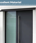 Keep Your Doors Bone Dry With This Badass Heavy Duty Aluminum Rain Drip Guard Featuring A Thickened 40 Inch Black Design That Diverts Heavy Rain With Zero Sweat While Protecting Windows And Camper Entries Perfectly. Mounted 40-inch black aluminum drip guard over a modern door.