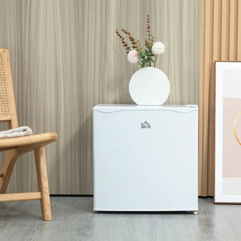Hella Quiet 1.1 Cu Ft Countertop Upright Mini Freezer In Snazzy Steel White with removable shelves in stylish setting.