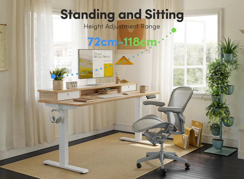 Fezibo 48 By 24 Electric Standing Desk With Double Drawers Maple Finish in a home office setting.
