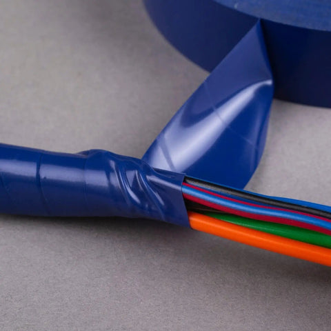 Close-up of Contractor Favorite Pro Grade Multicolor Electrical Tape applied on wires, showing blue vinyl tape in use.