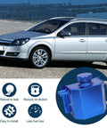 Fresh Rad Blue Universal Coolant Reservoir Tank With One Liter Capacity Radiator Overflow Bottle next to a silver car on a gravel surface.