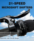 Close-up of Shimano 21-speed twist grip shifter on Womens 26 Inch Mountain Bike With Shimano 21 Speed Rear Derailleur Twist Grip Shifter Dual Disc Brakes Lockout Suspension Fork Steel Frame Two Point Three Five Inch Tires Eighty Five Percent Pre Assembled Ride Ready Cyan