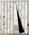Beige and gold floral blackout curtains installed in living room, soundproof, 84 inch length, 2 panels with tiebacks.