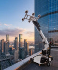 Heavy Duty Mobile Vacuum Glass Gripper For Smooth Site Setup And No Sweat Heavy Panel Lifting positioned on a rooftop.