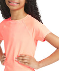 Close-up of Girls Swim Rash Guard Shirt With UPF 50 Plus Short Sleeve Sun Tee Fiery Coral Perfect For Beach And Pool Play X Large