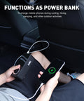 Cordless Tire Inflator With Gauge On The Go Mini Air Compressor being used as a power bank in a car, charging a smartphone