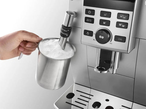 Super Automatic Espresso Machine With A Quiet Built In Grinder And One Touch Milk Frother Making Killer Daily Brews Using 15 Bar Pressure For A Smooth Relaxing Morning Routine In Sleek Silver Finish with milk frother and metal pitcher.