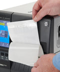 Slick ZT231 Upgraded Thermal Transfer Industrial Printer For Business Labeling with hand feeding label on output.