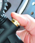 Close-up of hand adjusting Beefy Analog Pistol Grip Tire Inflator Gauge With Dual Head Chuck And 15 Inch Hose Liquid Filled Gauge
