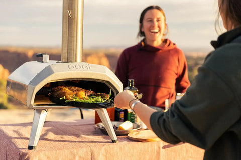 Karu 12 Multi Fuel Outdoor Portable Pizza Oven Delivers 950 F Heat For Wood Or Propane Cooks 12 Inch Pizzas In 60 Seconds