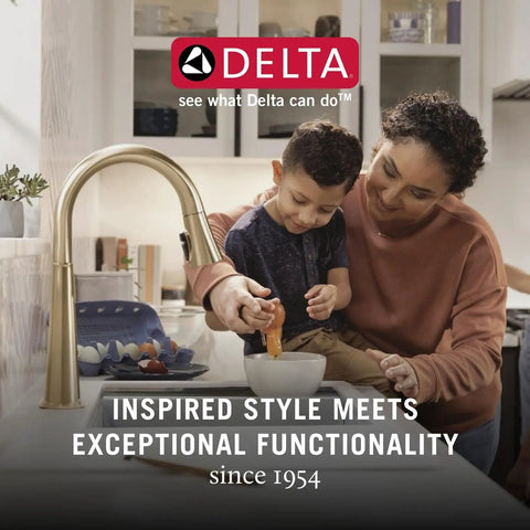Parent and child using a Delta kitchen faucet in stainless finish, modern kitchen scene with eggs on the counter.