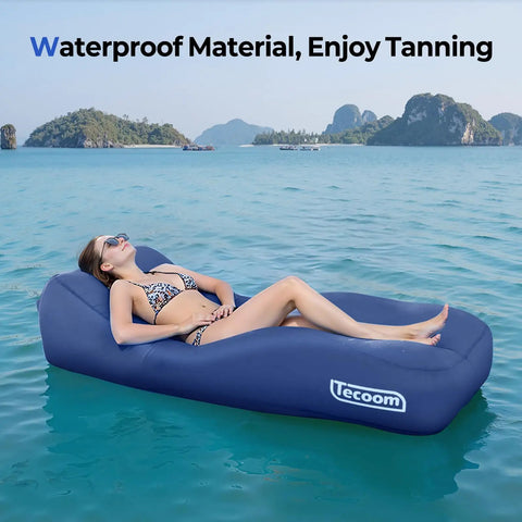 Inflatable Lounger Couch Air Sofa Hammock No Pump Needed 20 Second Inflation Waterproof Beach Chair on water with a person tanning