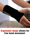 Person wearing Reversible Wrist Brace for Sore, Weak, and Injured Wrists, Breathable Comfort, while handling dishes.