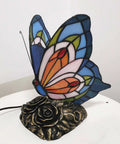 Butterfly Tiffany Style Stained Glass Accent Table Lamp Night Light with multicolored glass and floral base, side view