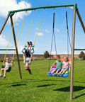 9.5 Foot Tall Swing Set For Backyard Setup With Platform Swing And Trapeze Bar Heavy Duty Metal Frame Green And Brown Outdoor Playground