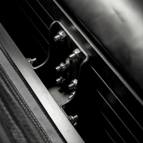 Stainless Steel Awning Mounting Brackets For Rooftop Tent Side Tracks, 1 Pair, showing close-up of installed heavy-duty side mount kit.