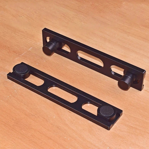 Woodworking Planing Stop Set Of 12 Pro Grade Durable Aluminum Alloy Clamps for workbench layout on wooden surface.