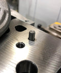 Installed 40 Pack M4x40mm Stainless Steel Dowel Pins 304 Grade Cylindrical Shelf Support Pins For Mechanical Projects And Furniture Installations Built To Last Pro Grade Heavy Duty Parallel Fasteners For Precise Alignment And Strong Joints on a metal surface.