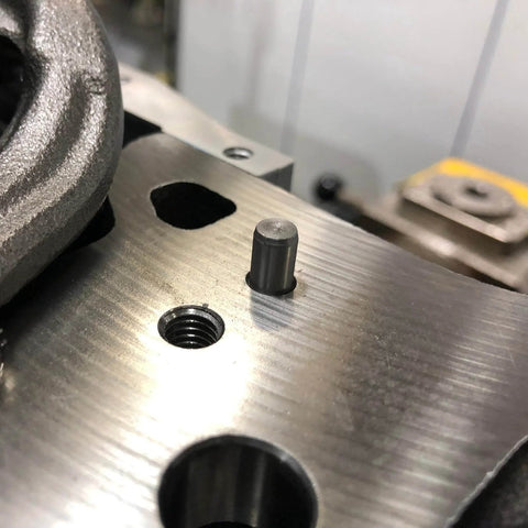 Installed 40 Pack M4x40mm Stainless Steel Dowel Pins 304 Grade Cylindrical Shelf Support Pins For Mechanical Projects And Furniture Installations Built To Last Pro Grade Heavy Duty Parallel Fasteners For Precise Alignment And Strong Joints on a metal surface.