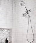 High Pressure Dual Shower Head With Handheld Spray Eight Settings Chrome Finish Three Way Diverter in a white tiled bathroom