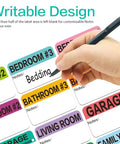 Hand writing on Massive 600 Count Moving Box Labels Pack For Three To Four Bedroom Homes With Writable Note Areas, color-coded labels