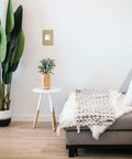 White Paddle Dimmer Switch With Smooth Rocking On Off Toggle And Easy Slider Dimmer For Quick Light Adjustments on wall near couch