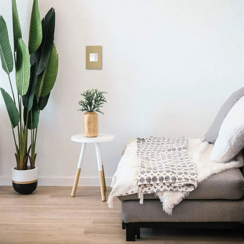 White Paddle Dimmer Switch With Smooth Rocking On Off Toggle And Easy Slider Dimmer For Quick Light Adjustments on wall near couch