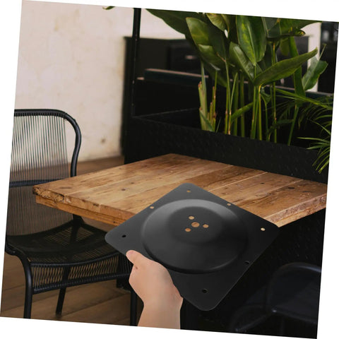 Solid As A Rock Heavy Duty Replacement Attachment Plates For Sofa Couch And Table Legs with hand holding black metal bracket.