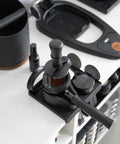 Top Shelf 58mm Espresso WDT Tool Featuring 16 Concentric Needles And Rock Solid Magnetic Base For Hella Even Puck Distribution Adjustable Depth Coffee Needle Stirrer Totally Nailing Shots Daily on a black coffee station.