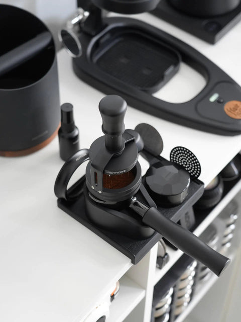 Top Shelf 58mm Espresso WDT Tool Featuring 16 Concentric Needles And Rock Solid Magnetic Base For Hella Even Puck Distribution Adjustable Depth Coffee Needle Stirrer Totally Nailing Shots Daily on a black coffee station.