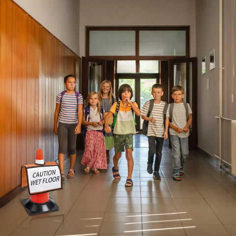 Students walking in hallway with 12 Pack Traffic Cone Sleeve With Pockets For Caution And Safety Signs Colorful Cone Covers