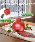 Hummingbird Feeder With Ant Moat For Outdoors 10 Oz Nectar Dispenser With Light Reflective Faceted Design on table