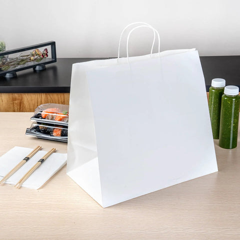 Sturdy White Paper Shopping Bags With Handles 14.2 By 8.3 By 13.2 Inches 100 Pack Durable Grocery Gift Bags on a table with takeout items.