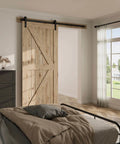 5.5Ft Single Sliding Barn Door Hardware Kit In Black Carbon Steel With Flat Track System for Closet, installed in bedroom