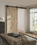 Bedroom with wood barn door featuring Beefy Heavy Duty Sliding Barn Door Hardware Kit For Ultra Quiet Smooth Operation, I Shape Roller.