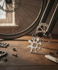 Compact Snowflake Shaped Multi Tool Wrench for Eyewear, Bike and Camping Repairs, metal EDC hex key set on wooden surface