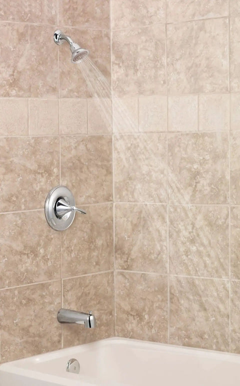 Oil Rubbed Bronze Tub And Shower Valve Trim Kit With Posi-Temp Finish, installed in bathroom wall, with valve and showerhead