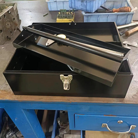 Portable 16 Inch Metal Toolbox With Heavy Duty 18 Gauge Steel Construction Black Large Tool Box Drawer Organizer Tackle Box Style With Metal Latch And Handle Corrosion Resistant Powder Coat For Home Garage Workshop on a table.