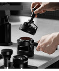 58mm WDT Needle Tool Coffee Distributor Complete Toolkit With Adjustable Dosing Ring And Premium Barista Leveler Espresso Puck Prep Hits Different Daily in use on countertop.