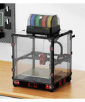 Klipper Rfid Filament Storage Box With Rgb Status Light For Automatic Spool Tracking And Dead Simple 3D Printing Workflow Compatible With Voron VZBot Killer Setup in a workshop showing colored spools.