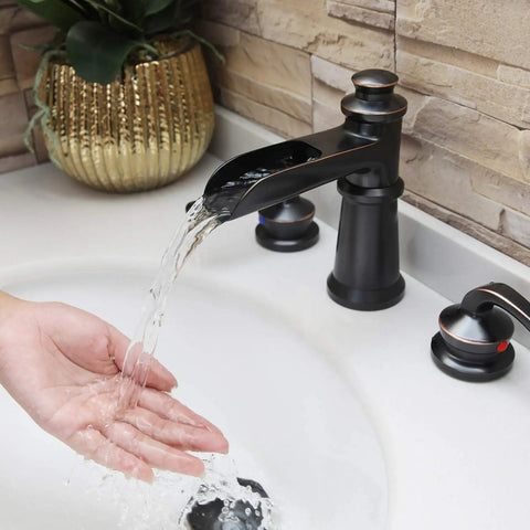 Waterfall Style Widespread Bathroom Faucet With 8 To 16 Inch Mounting Three Hole Two Handles Pop Up Drain Overflow in use