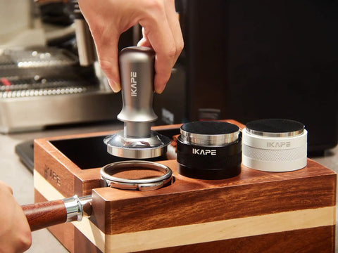 53mm Espresso Tamper Pro Grade Barista Coffee Tamper With Calibrated Spring Loaded And 100 Percent Flat Stainless Steel Base, Fits Breville 54mm Portafilter Basket in use