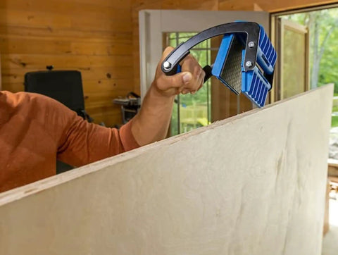 Panel Carrier For Plywood Sheets And Large Panels With Ergonomic Grip One Handed Carry Up To 100 Lbs Heavy Duty Carpentry Tool in use
