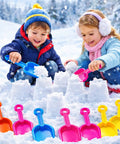 Children building snowcastles with colorful plastic shovels from 24 Pack Beach Shovels For Kids And Adults Heavy Duty Plastic Sand Toys Set.