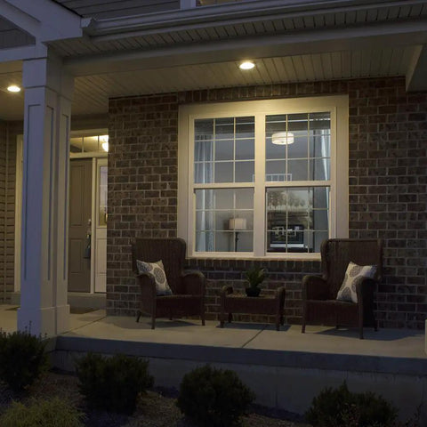 Privacy Mirror Window Film For Home Windows installed on a front glass window of a house, providing daytime privacy and UV blocking.