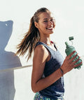 Person holding Foldable TPU Water Pouch Bottle for Outdoor Hydration, leakproof and refillable soft flask for adventures