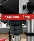 Close-up of a drill setup with an 8mm Eanosic marking for Metric Setup Blocks Height Gauge Set 15 Piece Pro Grade Precision Aluminum Setup Bars Gauge Block Set For Router And Table Saw Accessories In Woodworking, Stackable Blocks For Crisp Fences And Cuts With Laser Engraved Size Markings.