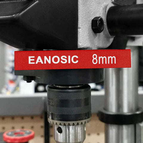 Close-up of a drill setup with an 8mm Eanosic marking for Metric Setup Blocks Height Gauge Set 15 Piece Pro Grade Precision Aluminum Setup Bars Gauge Block Set For Router And Table Saw Accessories In Woodworking, Stackable Blocks For Crisp Fences And Cuts With Laser Engraved Size Markings.